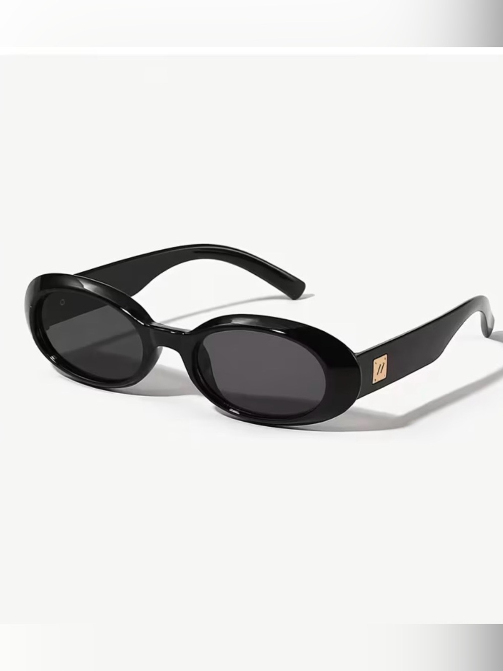 Black Oval Women’s Sunglasses with Gold Accent - Brand